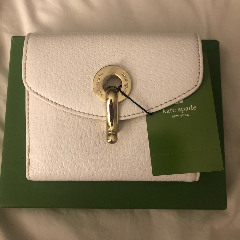 Brand New Kate Spade white wallet.